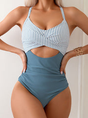 Traje de baño de una pieza con cintura alta, hueco y rayas, cruzado y con lazo en la espalda
