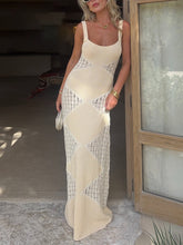 Vestido largo de punto transparente y calado de verano