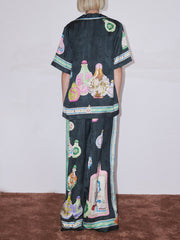 Camisa extragrande con botones y estampado divertido y único de satén