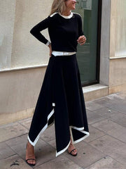 Suéter elegante de manga larga con cuello redondo y colores contrastantes