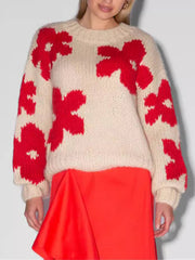 Suéter floral de cuello redondo que combina con todo