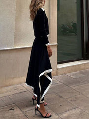 Suéter elegante de manga larga con cuello redondo y colores contrastantes