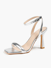 Tacones altos abiertos con una sola tira y tacón grueso