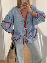 Camisa informal holgada con lazo y cuadros escoceses