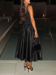 Vestido largo tipo chaleco sencillo y con parches