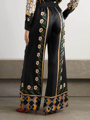 Pantalones anchos de cintura ajustada con estampado retro único