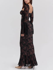 Zartes und elegantes schwarzes Langarm-Maxikleid aus Spitze