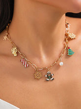 Collar con colgante de caramelo y muñeco de nieve navideño