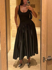 Vestido largo tipo chaleco sencillo y con parches