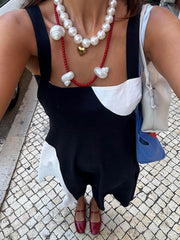 Vestido largo fruncido con espalda descubierta y color en contraste sencillo