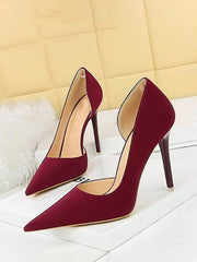 Tacones altos retro con punta hueca lateral