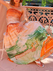 Elegantes, fließendes, plissiertes Maxikleid mit Wickelärmeln und Print in A-Linie