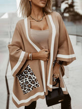 Suéter tipo cárdigan extragrande con bolsillo de leopardo y bloques de colores únicos
