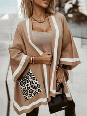 Suéter tipo cárdigan extragrande con bolsillo de leopardo y bloques de colores únicos