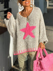 Suéter holgado con textura cálida y estampado de estrellas para día de invierno con colores contrastantes