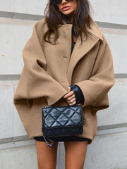 Und High-End-Woll-Strickjacke mit Revers und Fledermausärmeln