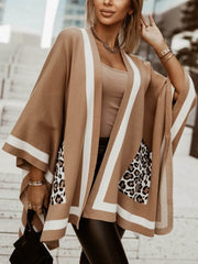 Suéter tipo cárdigan extragrande con bolsillo de leopardo y bloques de colores únicos