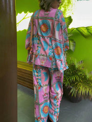 Pantalones anchos y sueltos con estampado retro único de sol deslumbrante