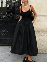 Temperamentvolles und leichtes Luxus-Maxikleid mit Hosenträgern und Plissee