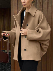 Und High-End-Woll-Strickjacke mit Revers und Fledermausärmeln