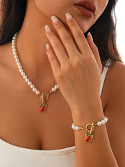 Conjunto de collar de regalo navideño con perla y campana