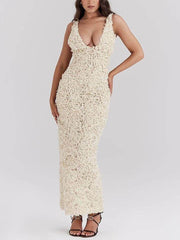 Elegantes Kleid mit tiefem V-Ausschnitt und Blumenapplikation