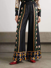 Pantalones anchos de cintura ajustada con estampado retro único