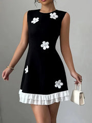 Retro Black Mini Dress with White 3D Floral Appliqués and Ruffle Hem