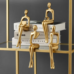 Golden Abstract Figurines