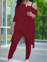 Conjunto de dos piezas de talla grande con un hombro al descubierto y pantalones