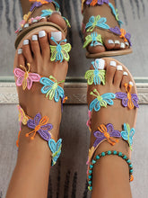 Strandsandalen mit Zehenring und Schmetterlingsmuster
