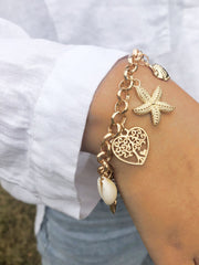 Pulsera de concha, estrella de mar, vieira y corazón