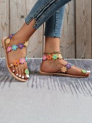 Sandalias con aro para el dedo del pie con estampado floral