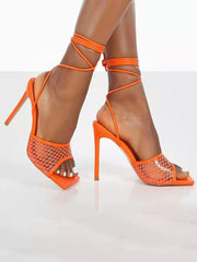 Tacones abiertos con lazo de PU