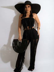 Zweiteiliges Outfit mit ärmellosem Oberteil und figurbetonter Hose