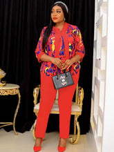 Conjunto de dos piezas de blusa y pantalón con estampado floral de manga larga