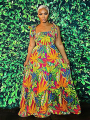 Vestido largo sin mangas con estampado floral y tirantes anudados