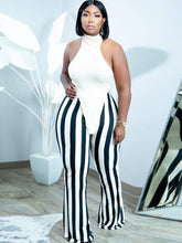 Tops sin mangas de dos piezas y pantalones ajustados a rayas