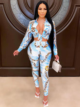 Conjunto de dos piezas de top corto estampado y pantalón largo