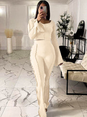 Pantalones acampanados de dos piezas con top corto