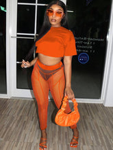 Conjunto de dos piezas de top corto de manga corta y pantalón de malla