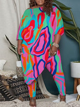 Tops de dos piezas con mangas de pulsera y pantalones ajustados