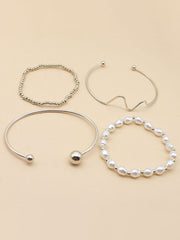 Pulsera elegante de cuatro piezas de perlas