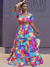 Conjunto de dos piezas de top corto a cuadros de manga corta y falda larga