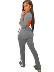 Trajes de pantalón de dos piezas con cremallera y bloques de color