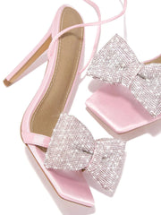 Tacones abiertos con lazo y purpurina