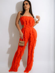 Zweiteiliges Outfit mit ärmellosem Oberteil und figurbetonter Hose