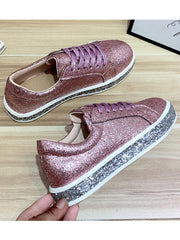 Zapatillas planas con cordones y brillo