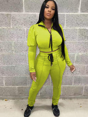 Zweiteiliges Crop-Top mit Reißverschluss und Hose mit Kordelzug