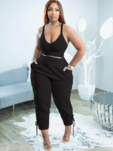 Conjunto de top con tirantes finos y pantalón largo